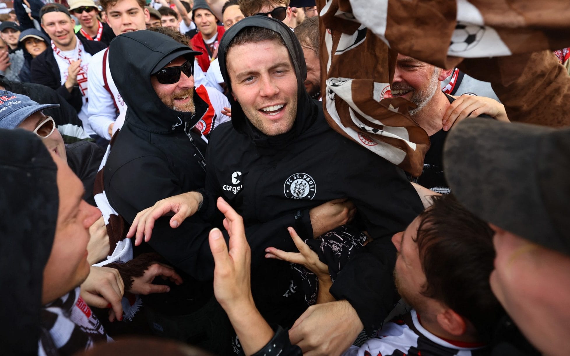 New Brighton manager, Fabian Hürzeler celebrating his Bundesliga promotion with St Pauli