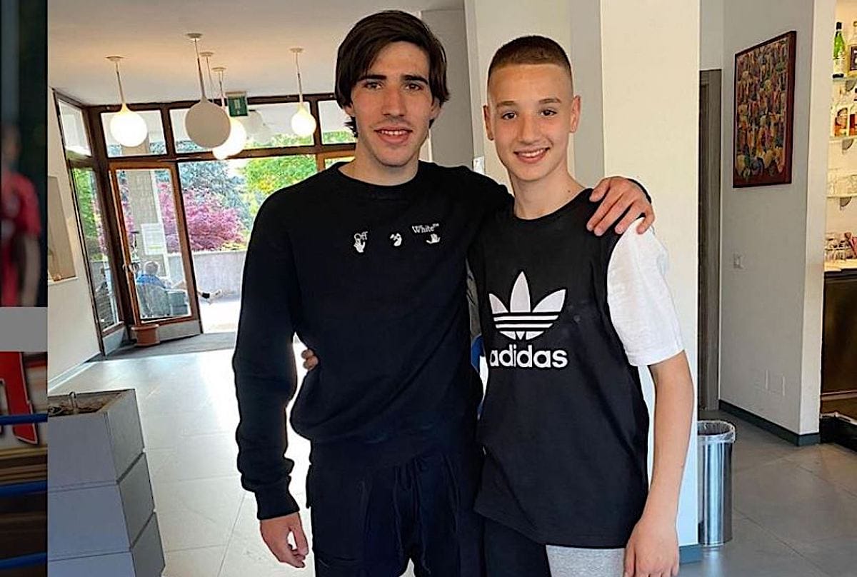 AC Milan's Francesco Camarda with Sandro Tonali in 2022